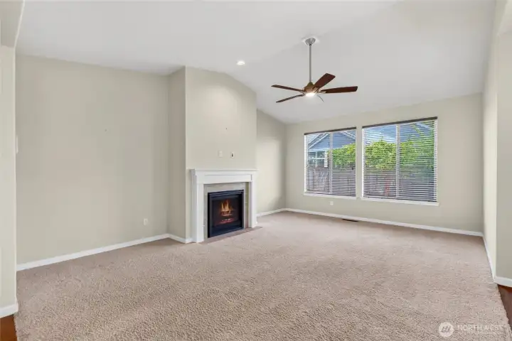Plenty of room for furniture. Add custom shelving on either side of the fireplace, if you choose!