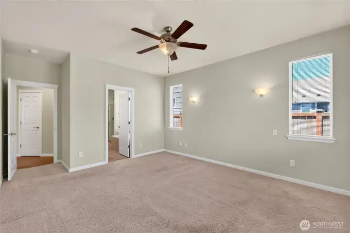 Primary Bedroom w/ceiling fan. This room is on the opposite side of the home from the other 2 Bedrooms/Bathroom.
