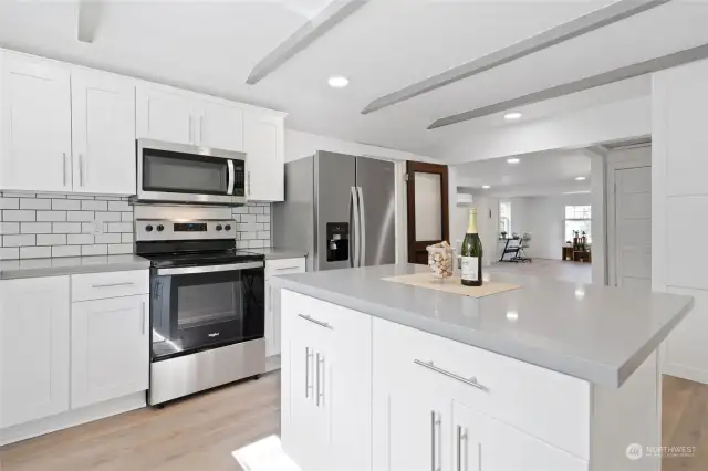 Open concept floor plan, filled with lots of natural light.