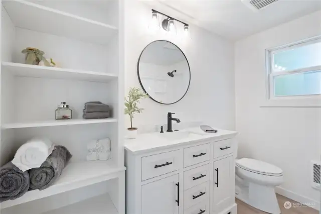 Recently updated full bathroom.  Solid surface countertop.