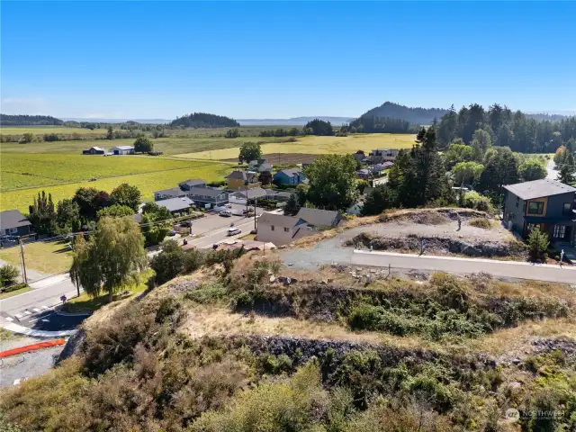 Soaring views from the edge of La Conner's newest neighborhood of modern PNW designed homes built by premier builder BYK.