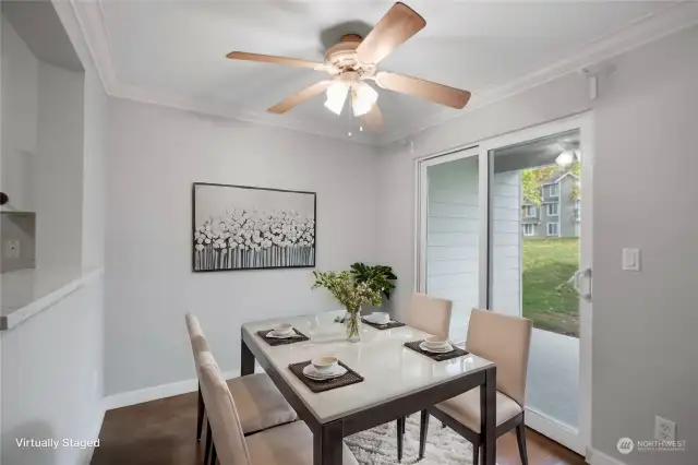 Dining Room next to Kitchen and back patio (virtually staged)