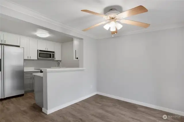 Open Kitchen and Dining area with a bar for serving!