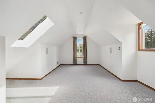 Finished room over garage-exercise room? Play room? Office?