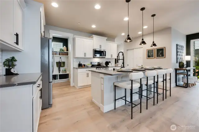 Photos of Model Home of Plan 2473 Elevation B at another community.  Details and colors will vary from home to home. No two homes are exact. Ask Broker for color selections for the listed property