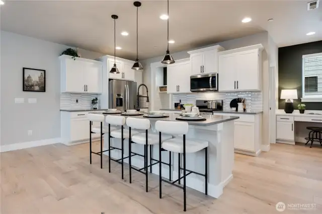 Photos of Model Home of Plan 2473 Elevation B at another community.  Details and colors will vary from home to home. No two homes are exact. Ask Broker for color selections for the listed property