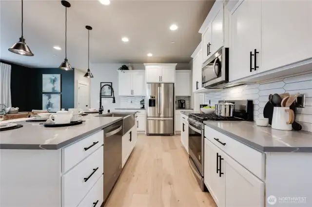 Photos of Model Home of Plan 2473 Elevation B at another community.  Details and colors will vary from home to home. No two homes are exact. Ask Broker for color selections for the listed property