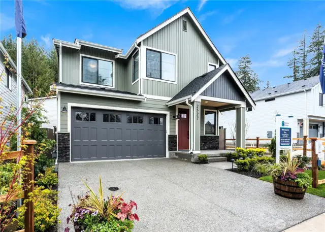 Photos of Model Home of Plan 2473 Elevation B at another community.  Details and colors will vary from home to home. No two homes are exact. Ask Broker for color selections for the listed property