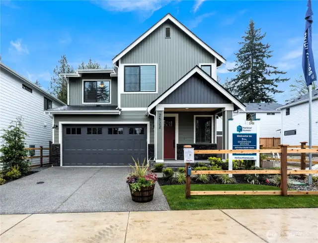 Photos of Model Home of Plan 2473 Elevation B at another community.  Details and colors will vary from home to home. No two homes are exact. Ask Broker for color selections for the listed property
