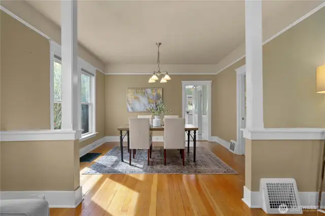 Dining room view from living room through to kitchen