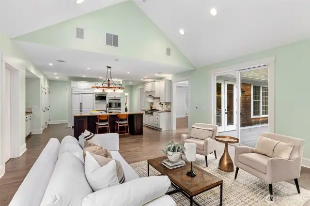 Family room, open to the kitchen and deck.