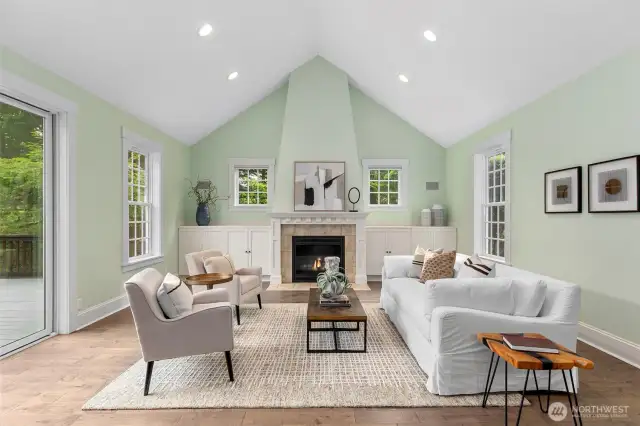 Family room with built ins and fireplace.