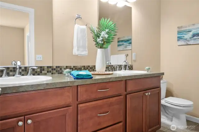 Dual sink vanity in the primary bathroom.