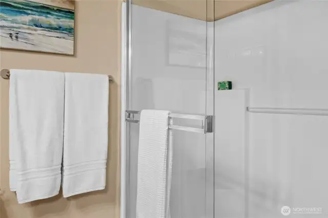 The shower in the primary bathroom.