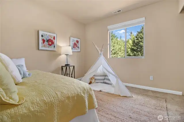 One of the 4 total bedrooms upstairs.