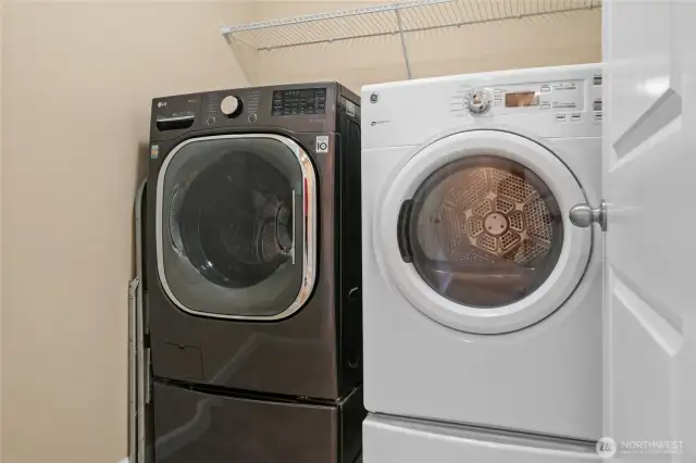 The laundry room is conveniently located upstairs.