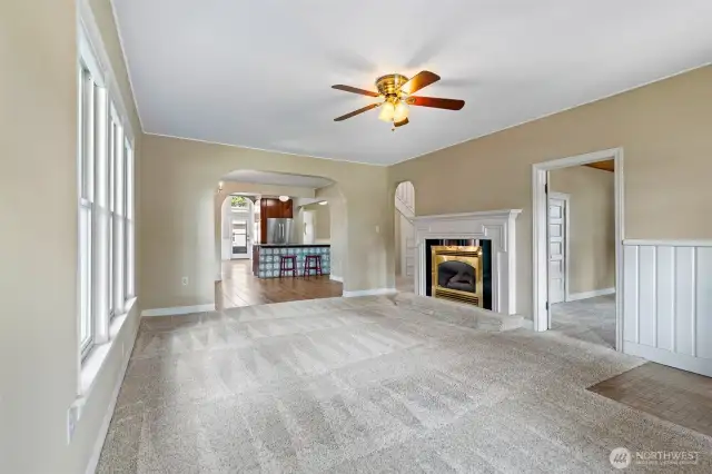 Old world open concept with arched doorways.