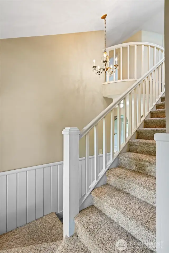 Beautiful split access stair case. Enter from the bedroom side or the dining room side.