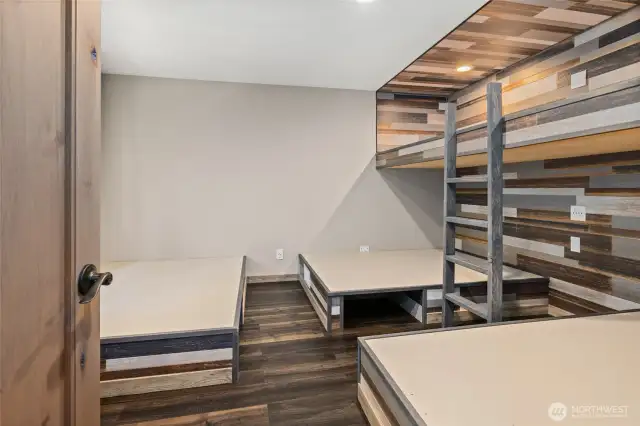 Welcome to the Bunkroom.  Sleeps 8 people.  Platforms already in place for three Queen Beds with storage below, and two elevated twin beds.