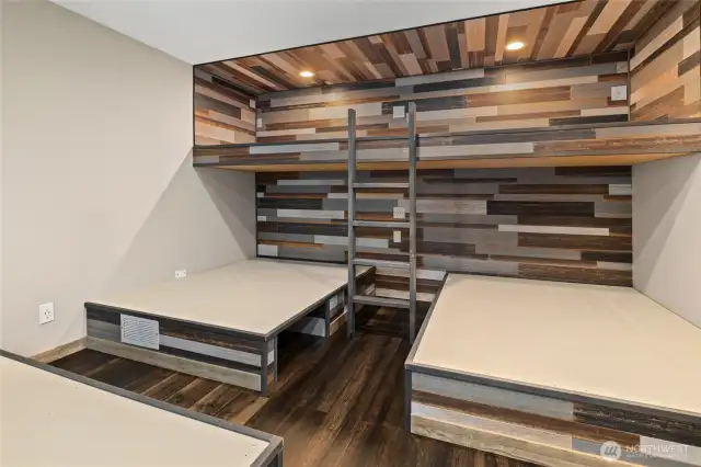 Notice the storage!  More of the custom wood plank walls.