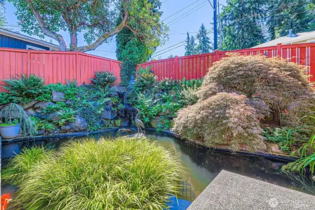 Open the entry gate to this tranquil setting as you walk down the floating sidewalk to the main entry door.