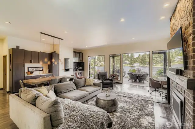 Another view of the living room, dining area and wet bar.