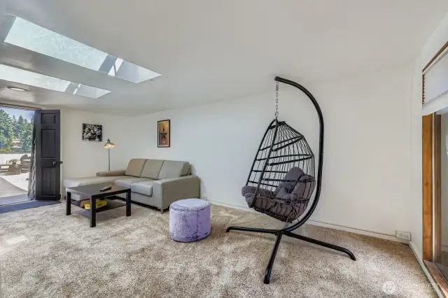 One level up is bonus space. You decide if it's a game room, TV/Movie room or another bedroom as it does have a closet. The door on the left accesses the rooftop deck.