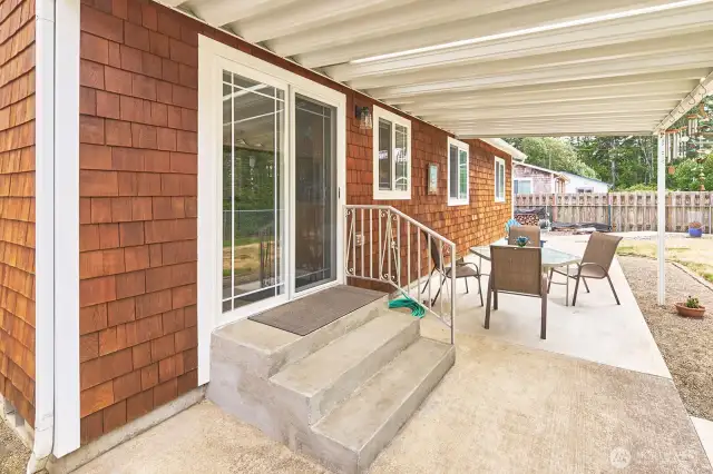 Slider off kitchen/dining area makes backyard BBQs a breeze.