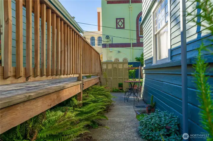 Side Yard walk to side entrance to condo