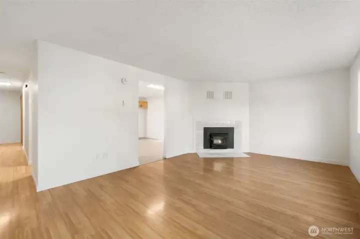 Large living space with wood fireplace to keep you warm on chilly nights.