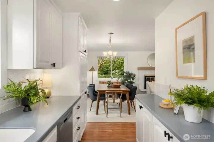This view highlights the easy flow from the kitchen to dining area.
