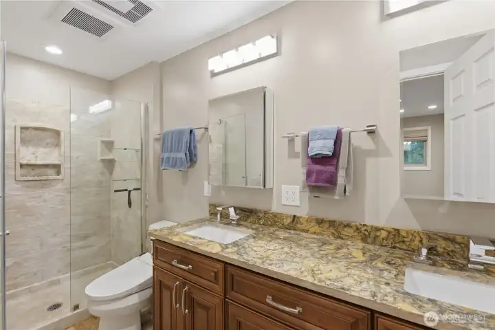 Main fl primary bath dbl vanity amazing large medicine cabinets, bidet toilet, upgraded tiled shower
