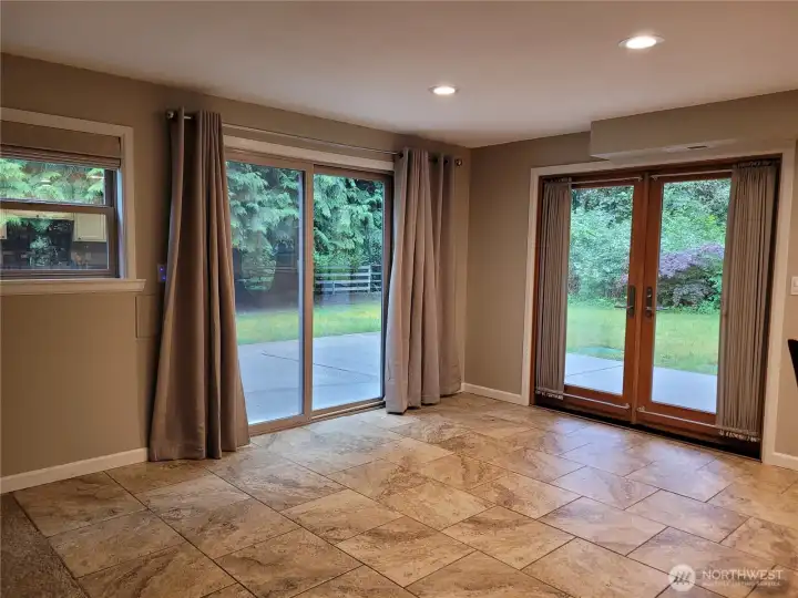 Doors to enter and to sit on private patio lower unit