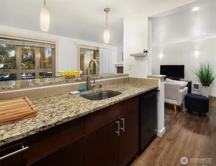 Open to the living room and dining area