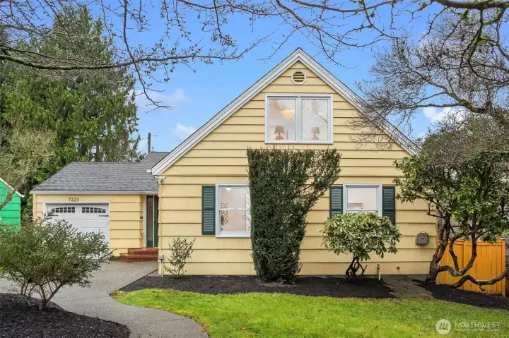 This is the neighborhood everyone dreams of in Seattle and this home exudes charm, comfort, fun and love!