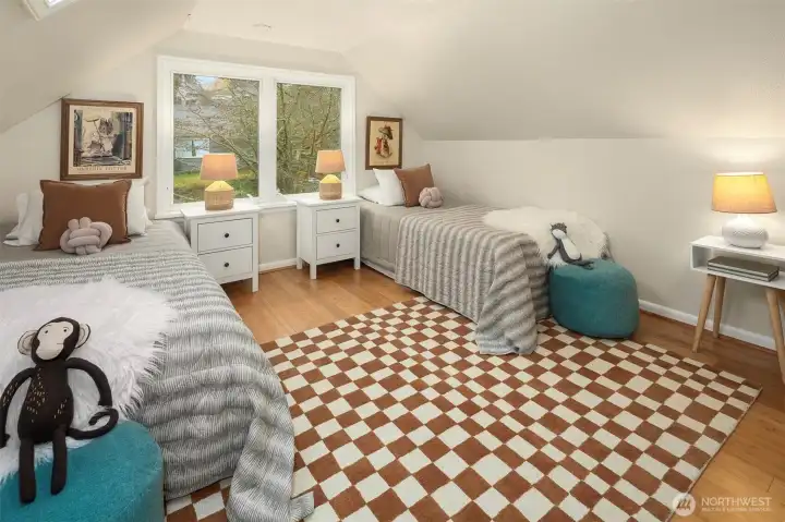 This bedroom is very large and welcoming!
