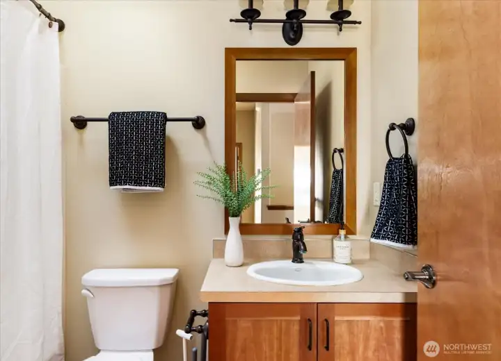 Guest bath on the main floor allows for easy access while entertaining.