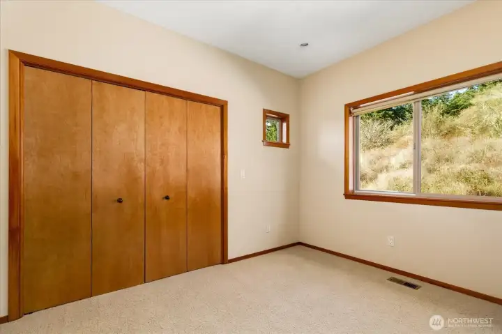 Main floor second bedroom can also be used as a private office.