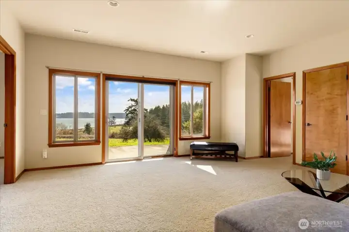 The family room is perfect for movies and game nights. It can also be an exercise space with a view.