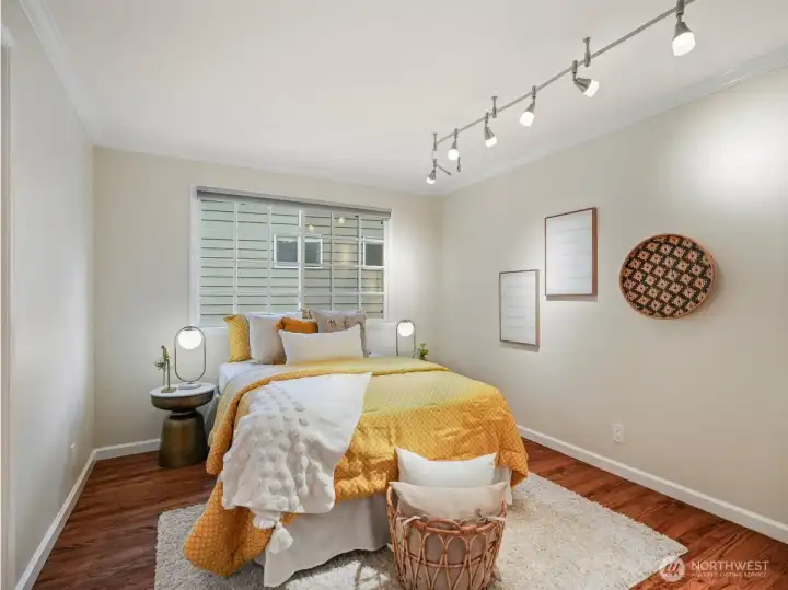 Bedroom four is centrally located upstairs and filled with natural light, offering a bright and comfortable retreat.