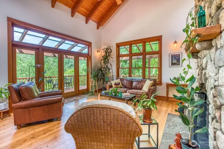 Vaulted ceilings fill the living areas with light.