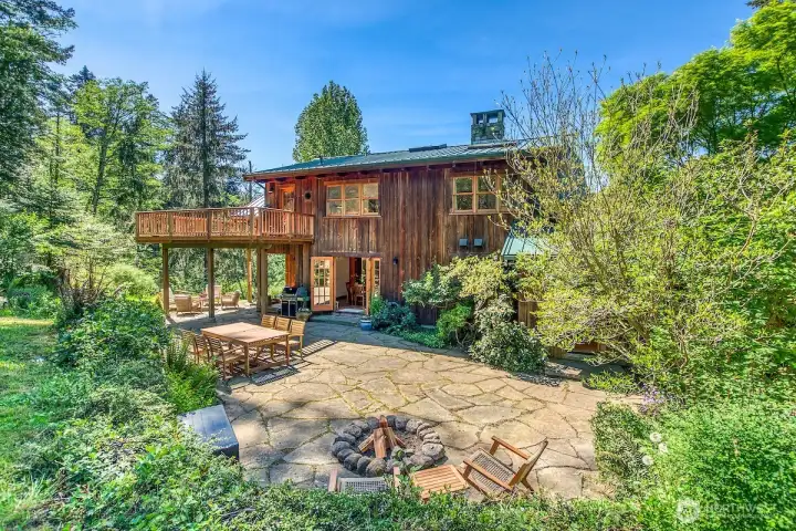 Relax on the back patio with French doors to the dining and kitchen and pantry.
