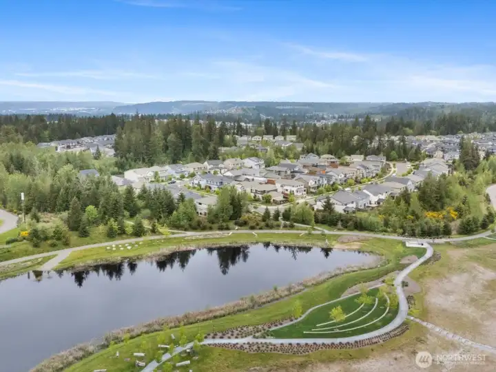 Vibrant community w/ 17 parks, skate park, dog park, 40 miles of trails. Clubhouse in 2027: pickleball, fitness ctr, cafe, yard games, event space +.