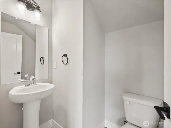 1/2 bath next to kitchen.