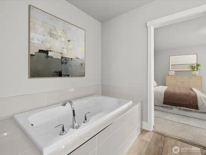 Lovely soaking tub w/ shower next to it.