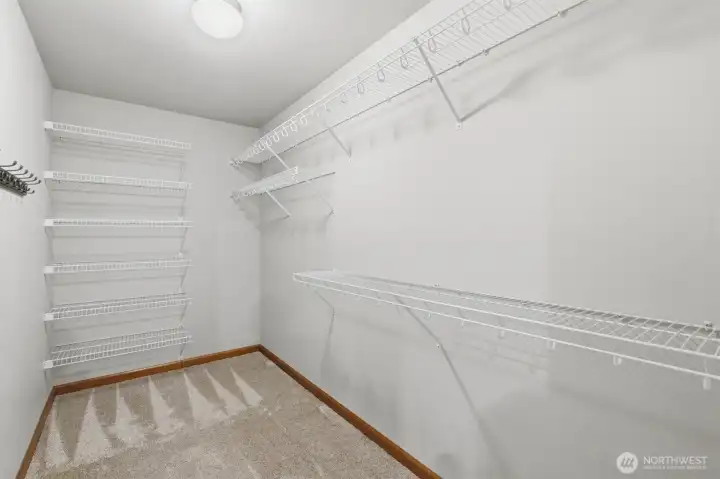Primary walk-in closet.