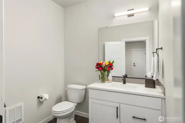 Half bath adjacent to media room.