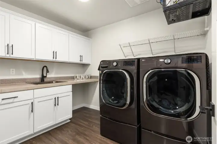 Upstairs laundry with lots of storage