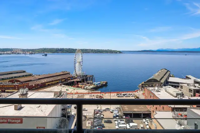 Sweeping views of Elliott Bay and Olympic Mountains, wrap-around patios, spacious rooms  & soaring ceilings.