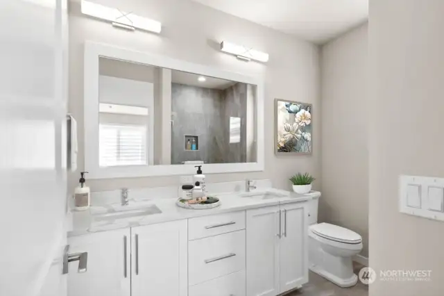 Virtual staging. Primary bathroom with thick slab quartz countertops, double undermount sinks, and a large fully tiled shower.